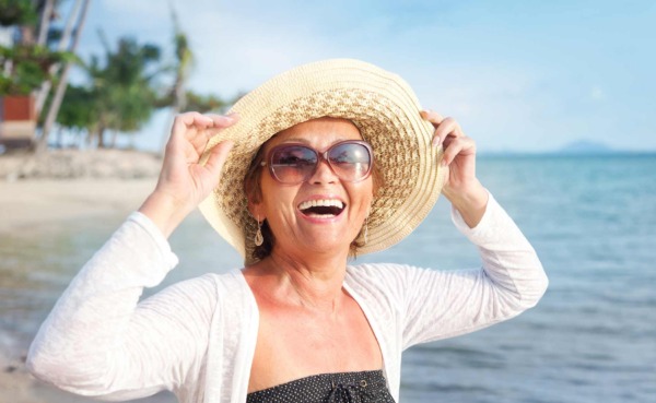 large image 2-col happy older woman at beach